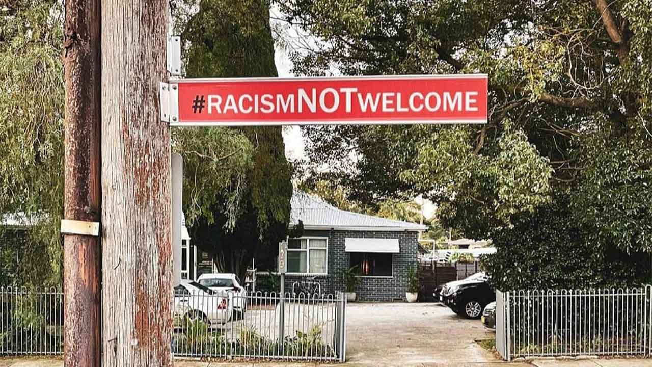 Anti-racist street signs slammed in ﻿wealthy suburbs