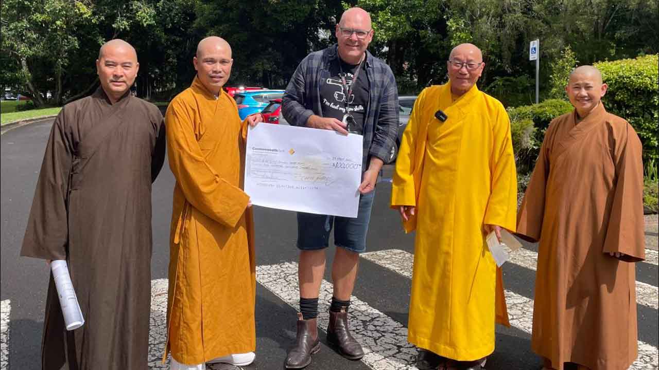 Buddhist monks travel from Sydney to Lismore with huge gift