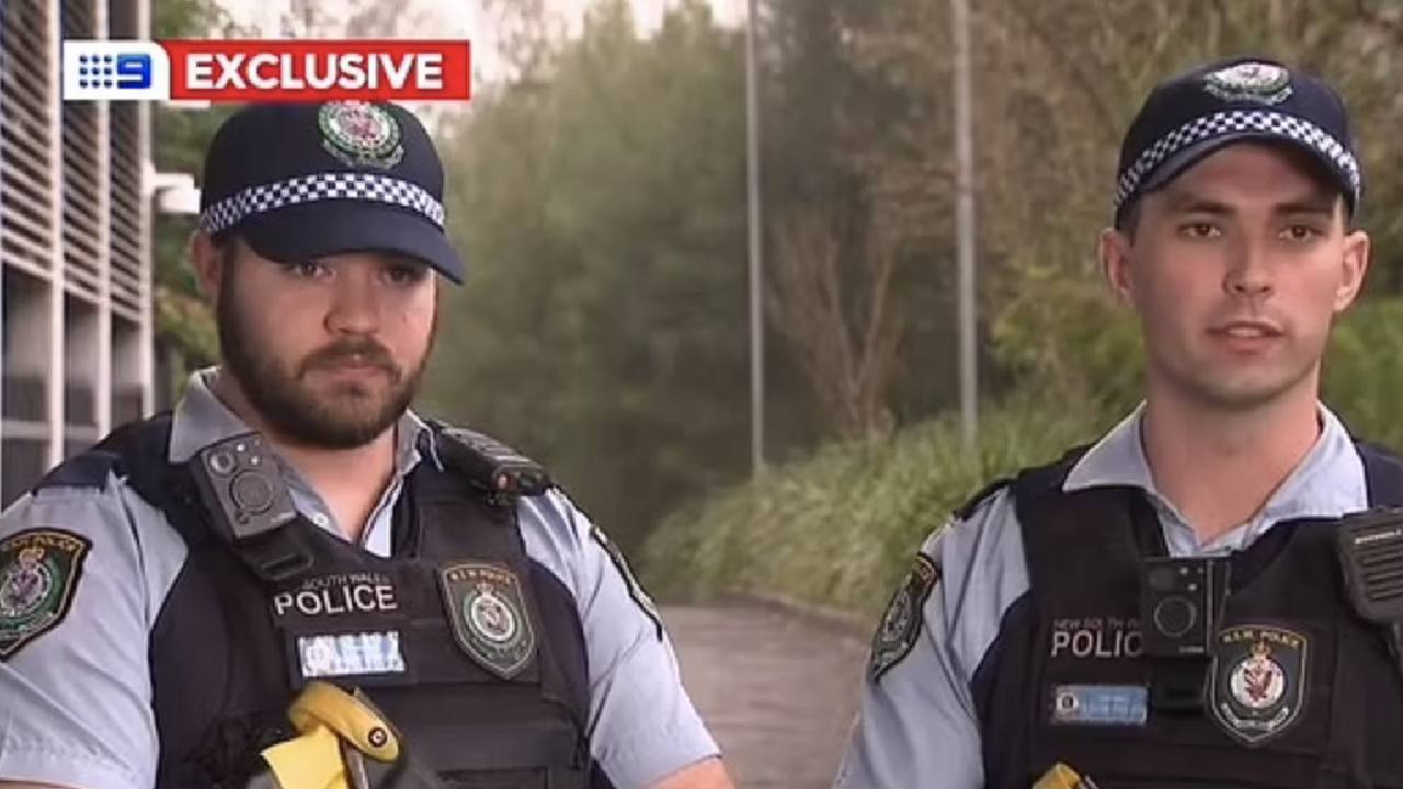  Two police officers hailed as heroes after saving man from flood waters