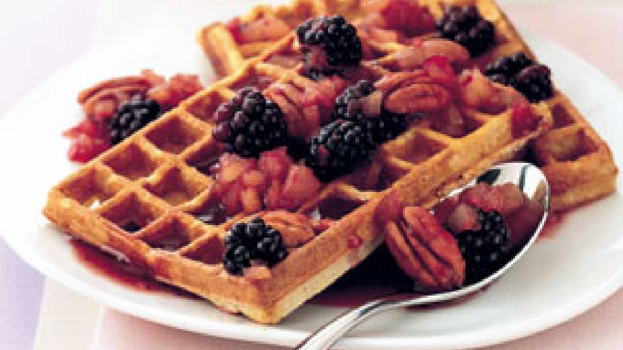 Pecan waffles with maple and blackberry sauce