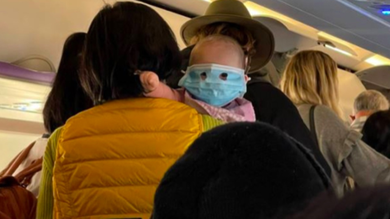 Baby wearing face mask on flight causes outrage online