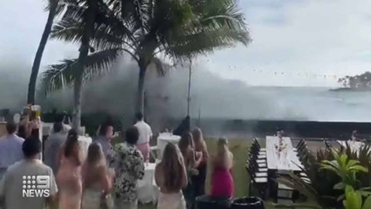 Wedding swamped by massive waves