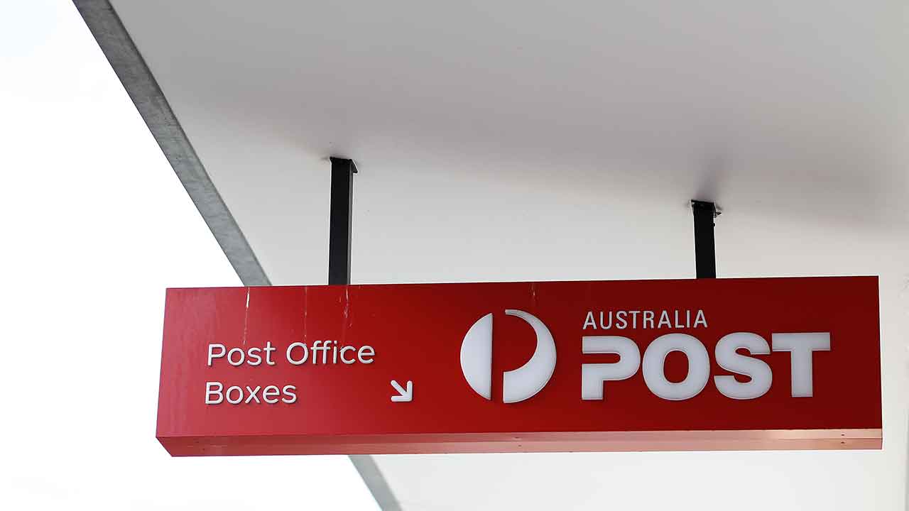 Australia Post apologises for “racist” sign