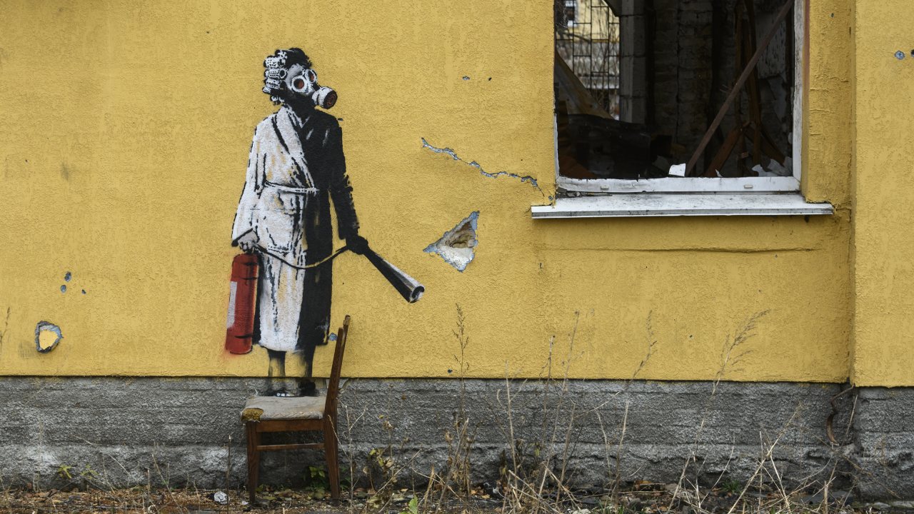 Banksy unveils new works on destroyed buildings in Ukraine