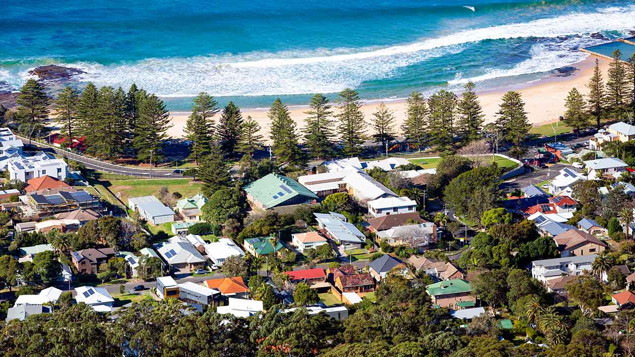 Coastal property prices and climate risks are both soaring. We must pull our heads out of the sand