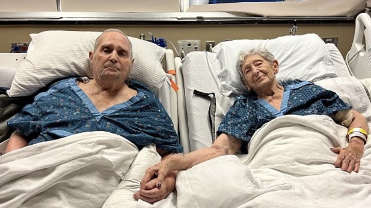 Dying husband and wife spend their final days holding hands