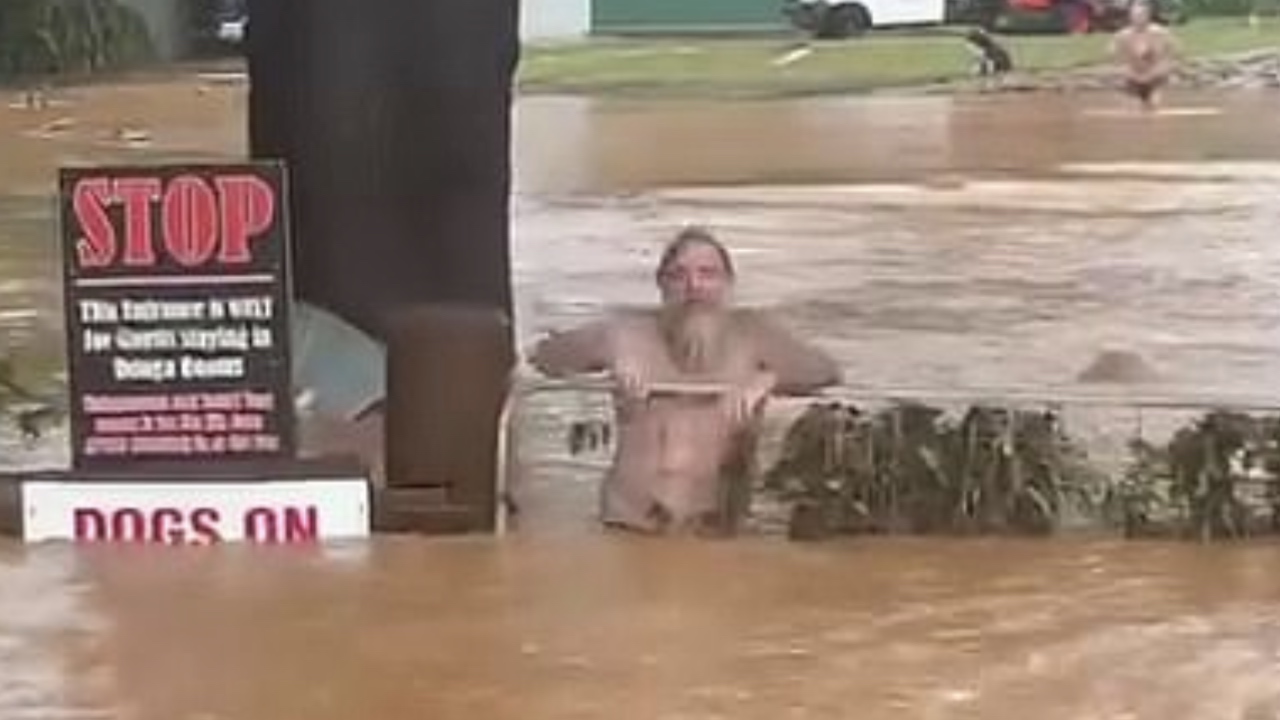 Man's hilariously Aussie response to rising flood water