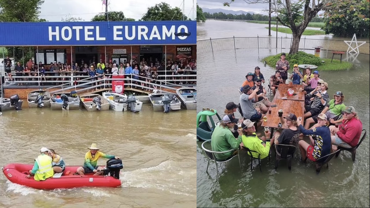 Aussies brave flood waters for a drink at the pub