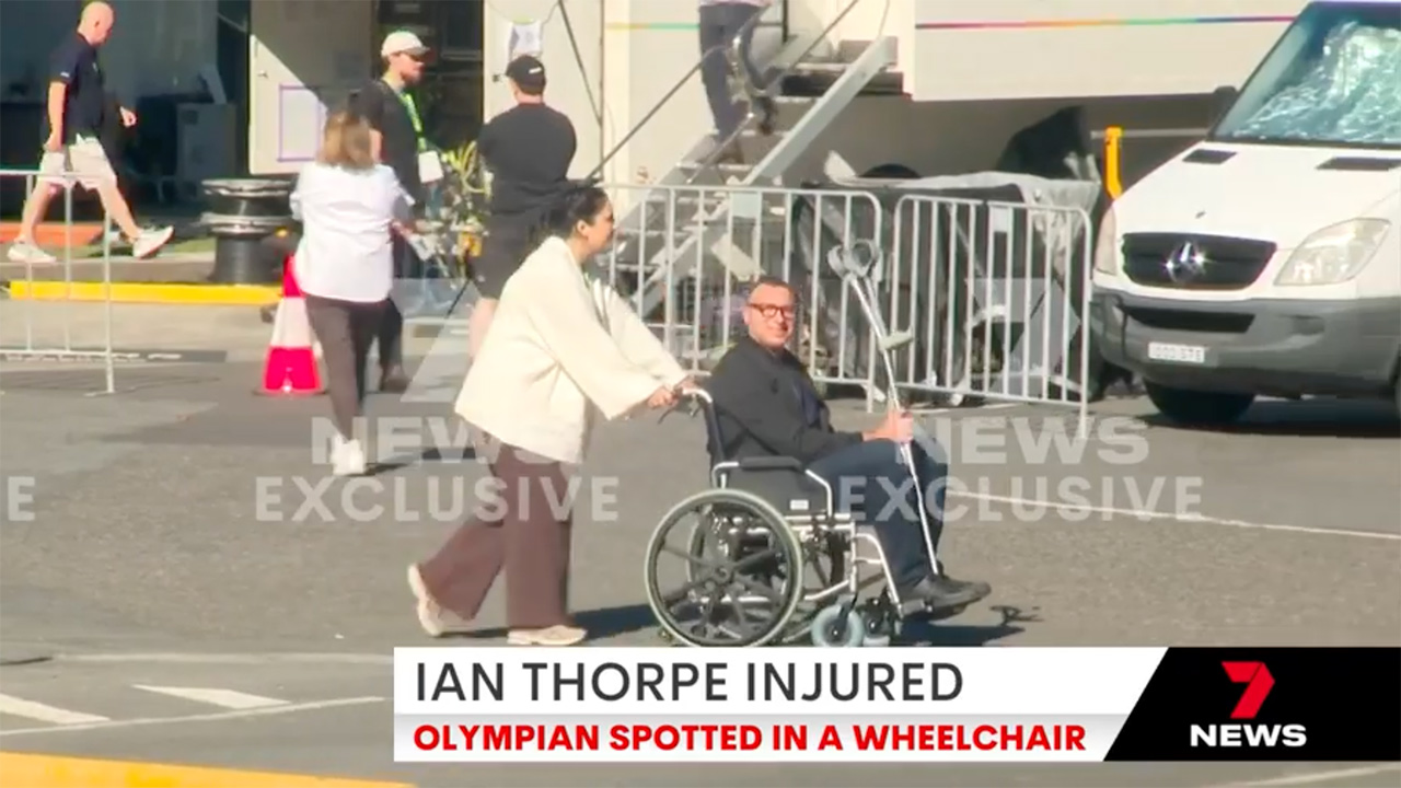 Injured Ian Thorpe spotted in wheelchair