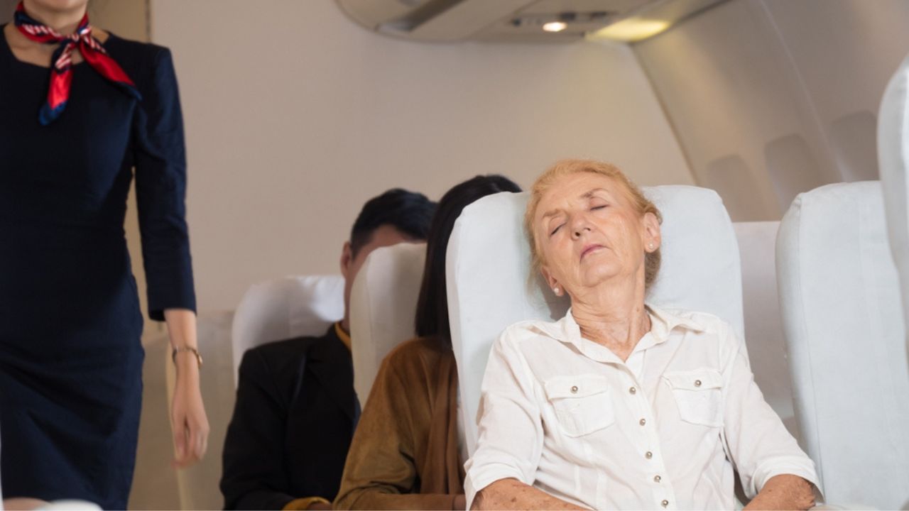 Passenger sparks debate over travellers sleeping in aisle seats