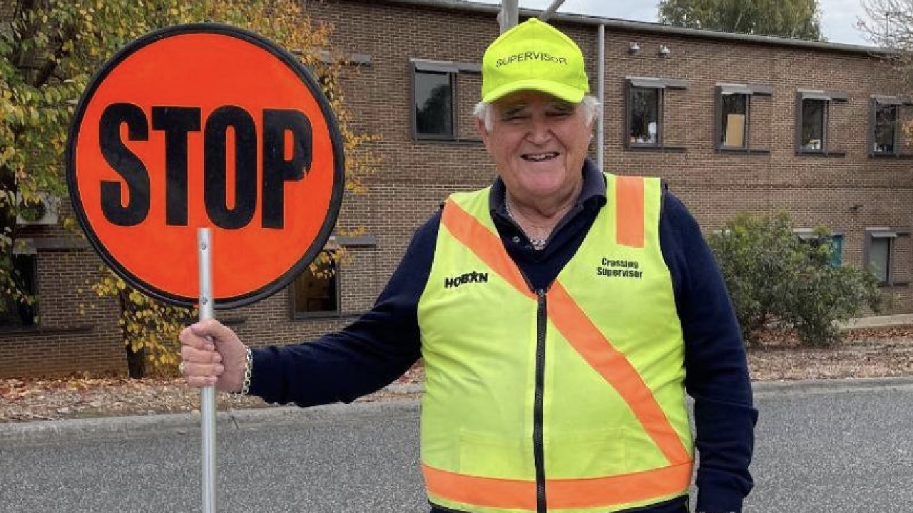 Lollipop man slapped with ban over "innocent" gesture