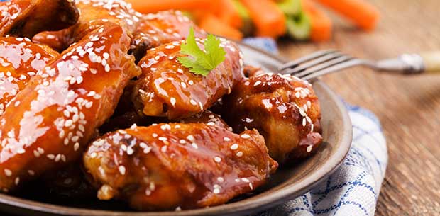 Fried chicken wings with honey and sesame glaze | OverSixty