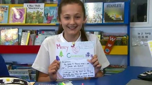 School children deliver handmade Christmas cards to nursing home residents | OverSixty