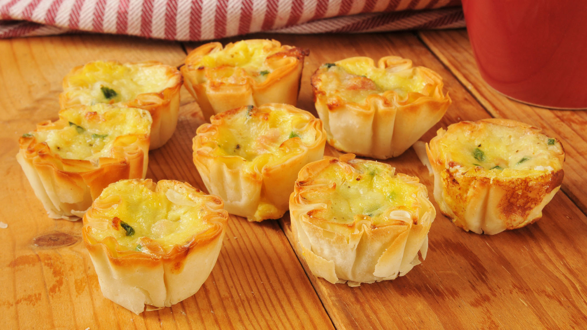 Mini smoked salmon and parsley quiches | OverSixty