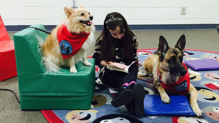 Therapy dogs are motivating kids who struggle to read
