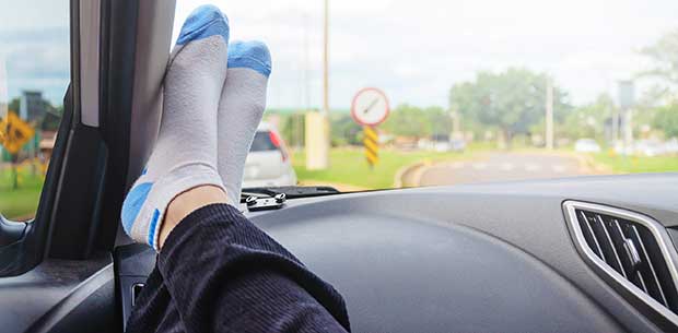 Scary reason why you should never put your feet on the dashboard of a car
