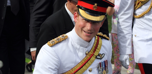 Queen knights grandson, Prince Harry, in private ceremony