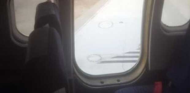 Passengers' horrifying shock as door falls off plane | OverSixty