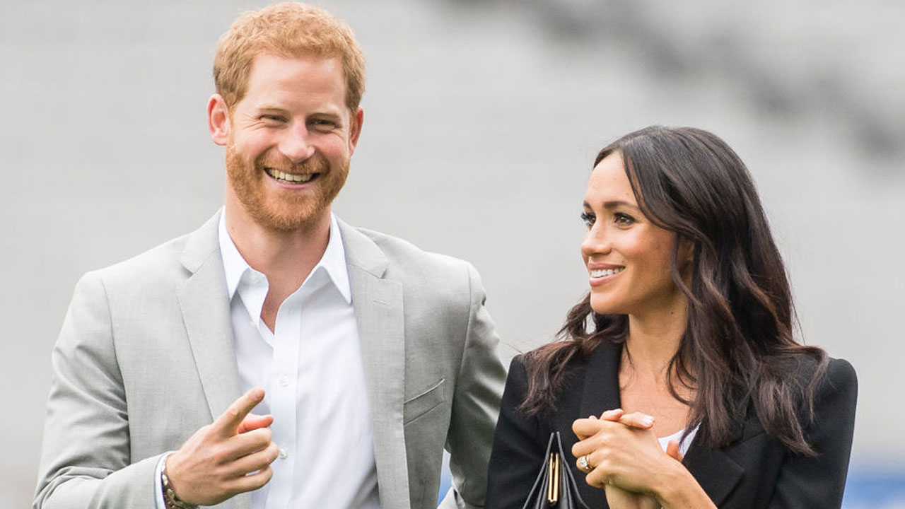 Just like us! Prince Harry and Duchess Meghan spotted catching public transport