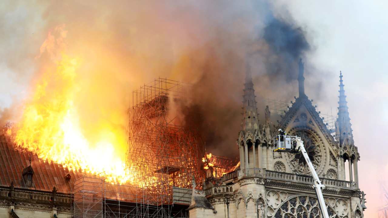 "Everything is burning": Thousands watch in horror as iconic Notre Dame cathedral blazes