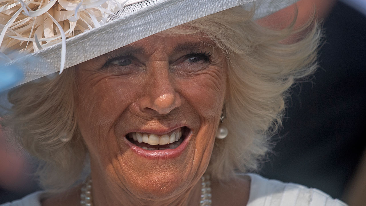 Duchess Camilla wows in white at first royal garden party of the year