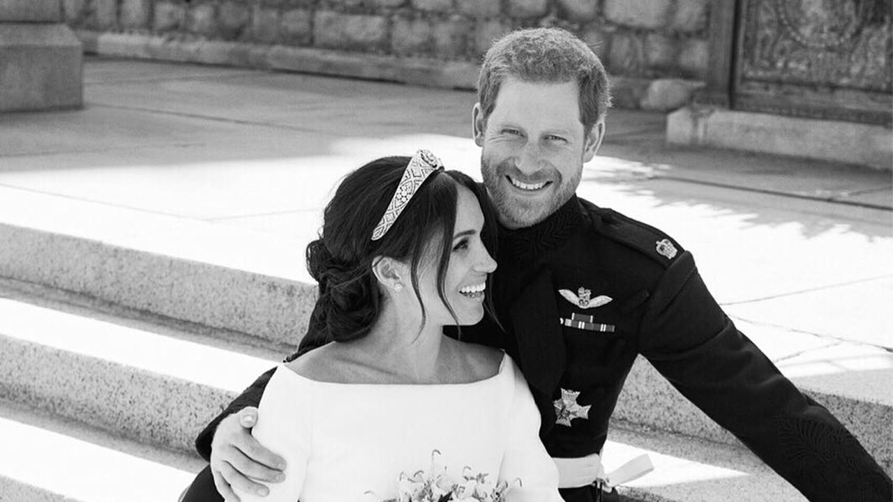 Happy anniversary! Prince Harry and Meghan share never-seen-before wedding photos