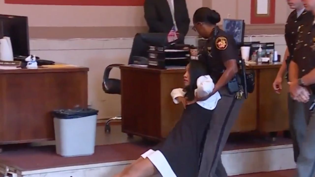 The shocking moment judge is dragged from court to begin prison