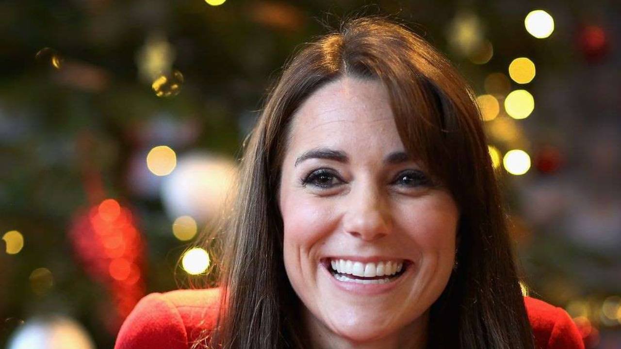Royals get in the Christmas spirit! Duchess Kate pulls out red for the festive season 