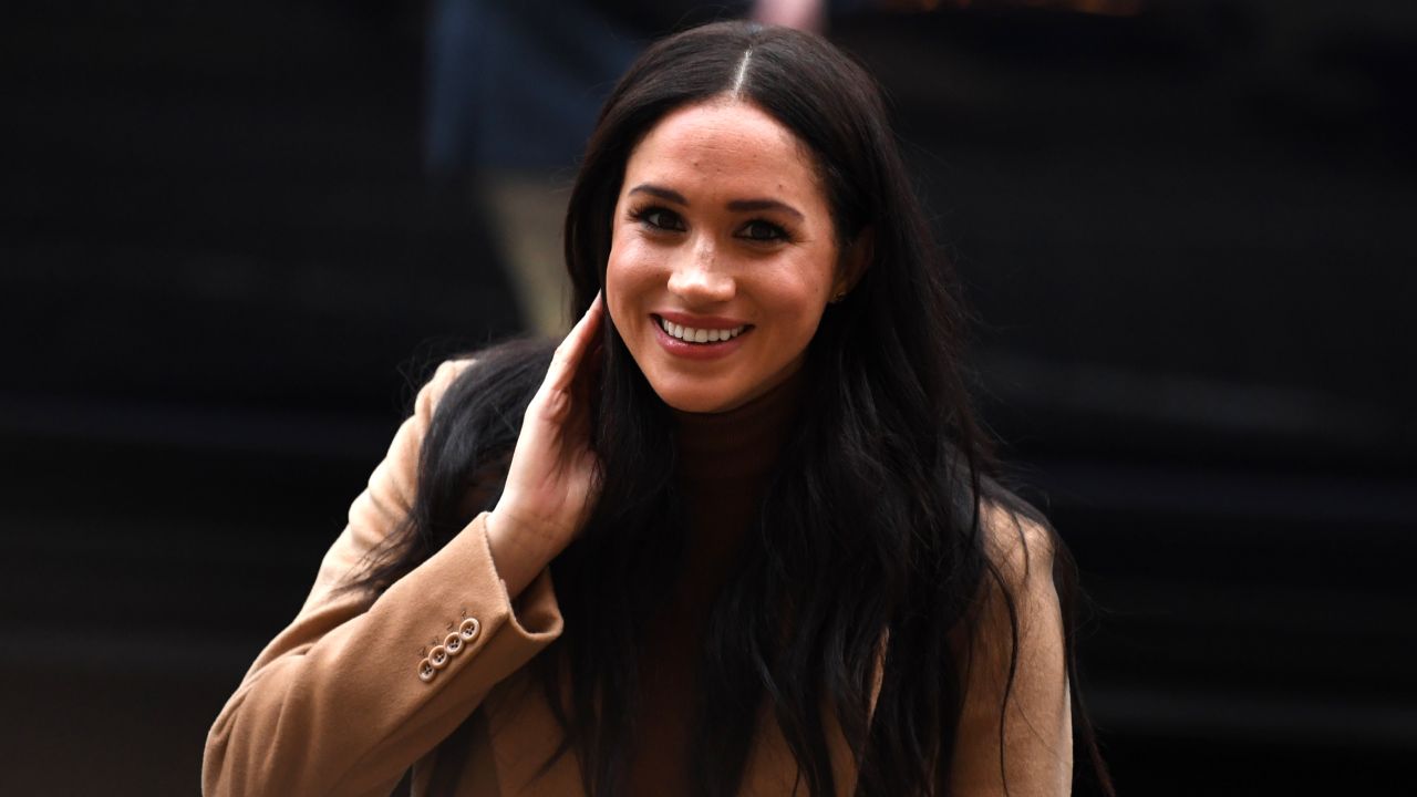 Walk it off: New pics emerge of Meghan and Archie in the aftermath of Megxit