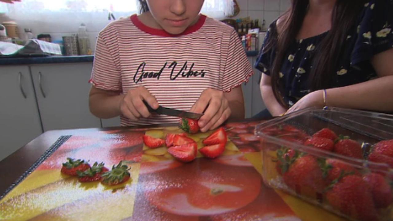 Woolworths under fire after mother finds something sharp in daughter’s strawberries
