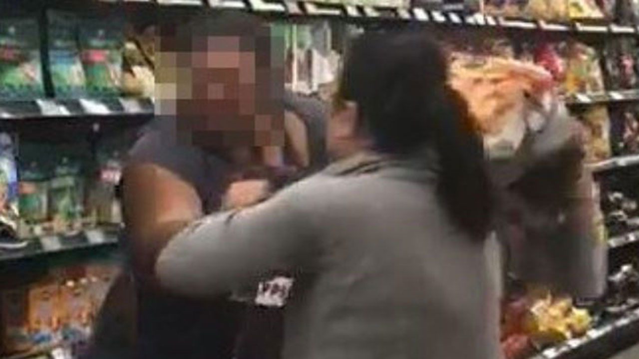 Two women charged over Woolworths toilet paper brawl