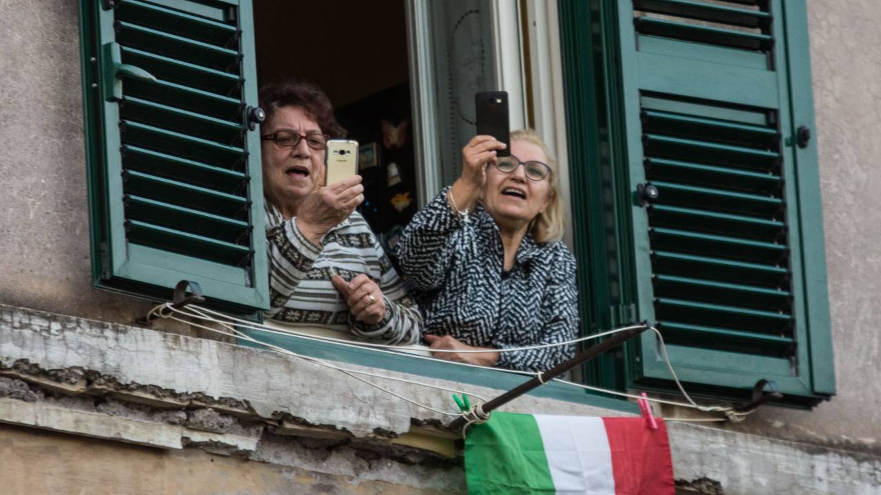 Free impromptu concerts break out from Italian rooftops and balconies 