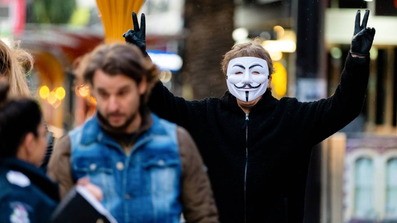  Strange chant emerges as conspiracy theorists take to streets to protest lockdown