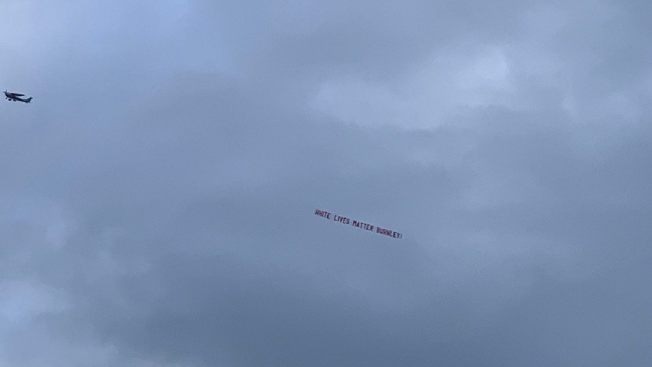 “White Lives Matter” banner flown above football match