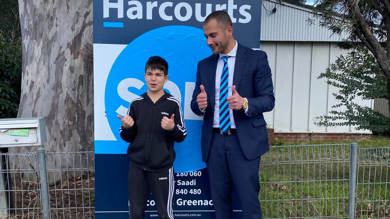 Eight-year-old boy snaps up $970,000 property at auction