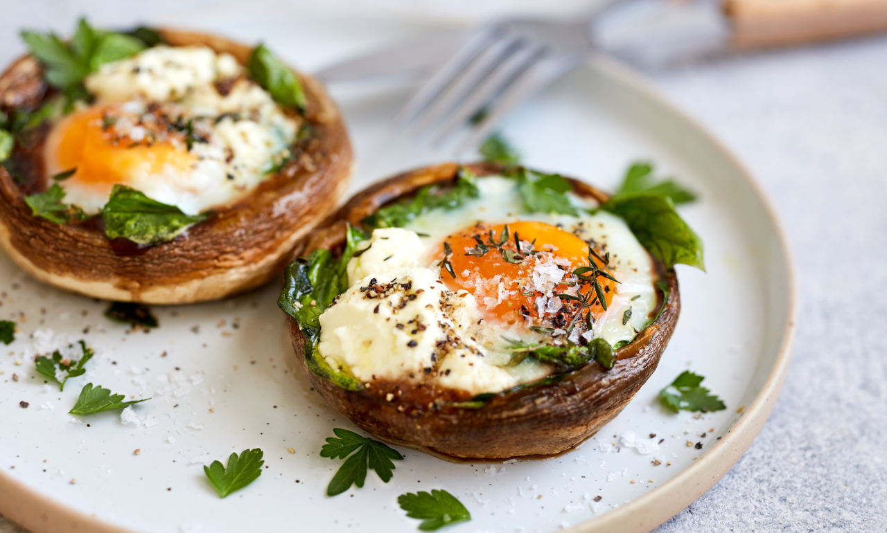 Baked breakfast mushrooms stuffed with spinach, feta and egg