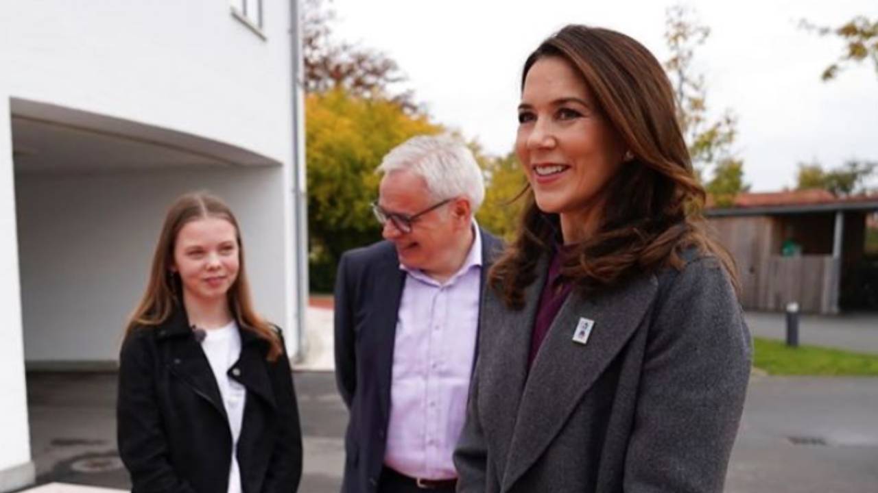 Princess Mary looks pretty in purple as she reveals annual Christmas stamp