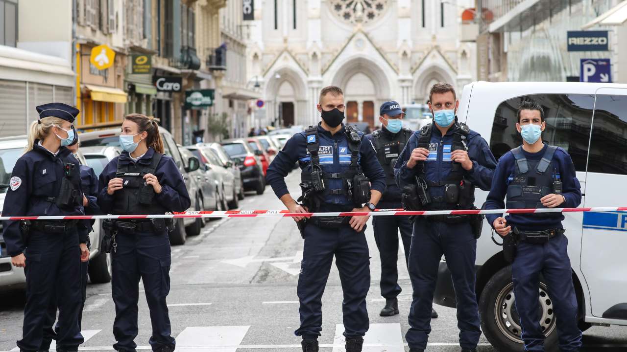 France under siege after beheading in church