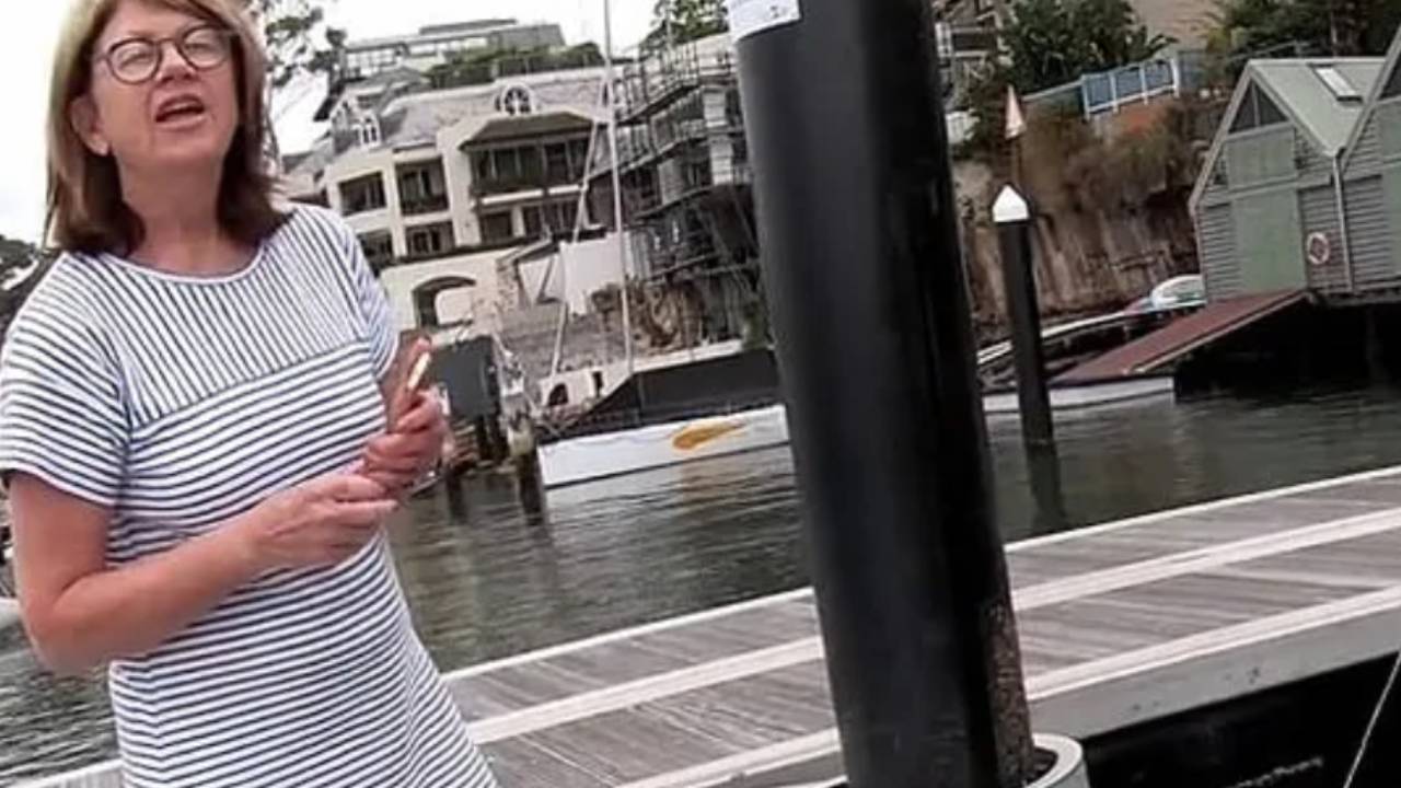 "Karen" caught on camera threatening fisherman