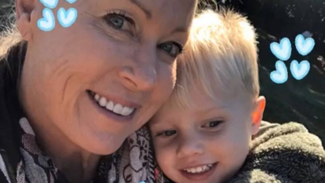 Lisa Curry returns to the pool with adorable grandson