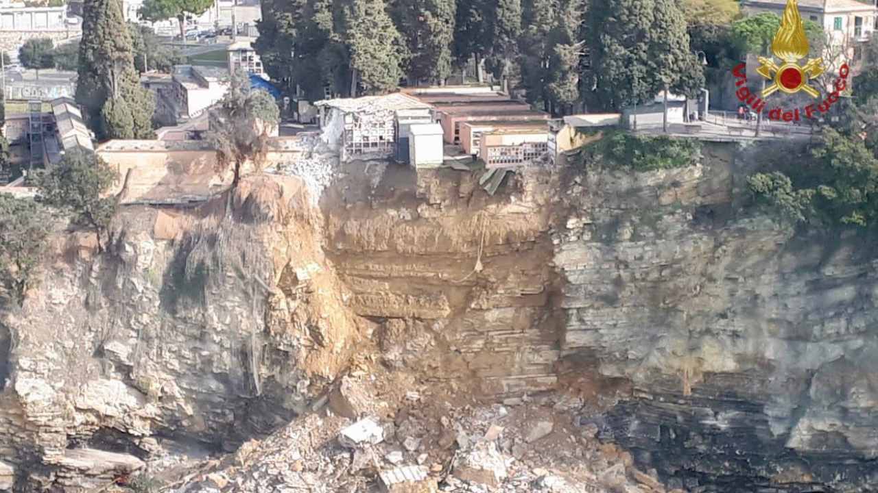 Tragic scenes as clifftop cemetery collapses into the sea