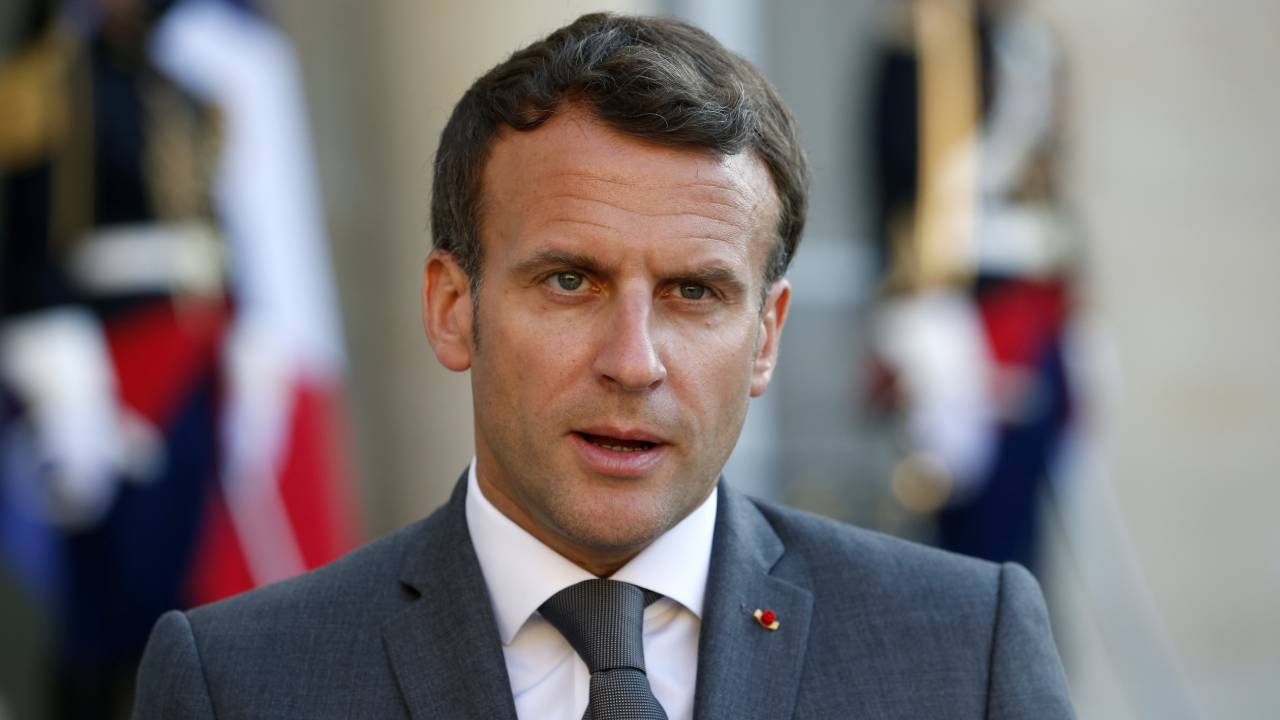 French President slapped in the face during public tour