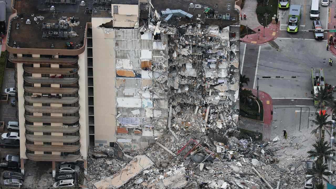 Nearly 100 people missing after building collapses