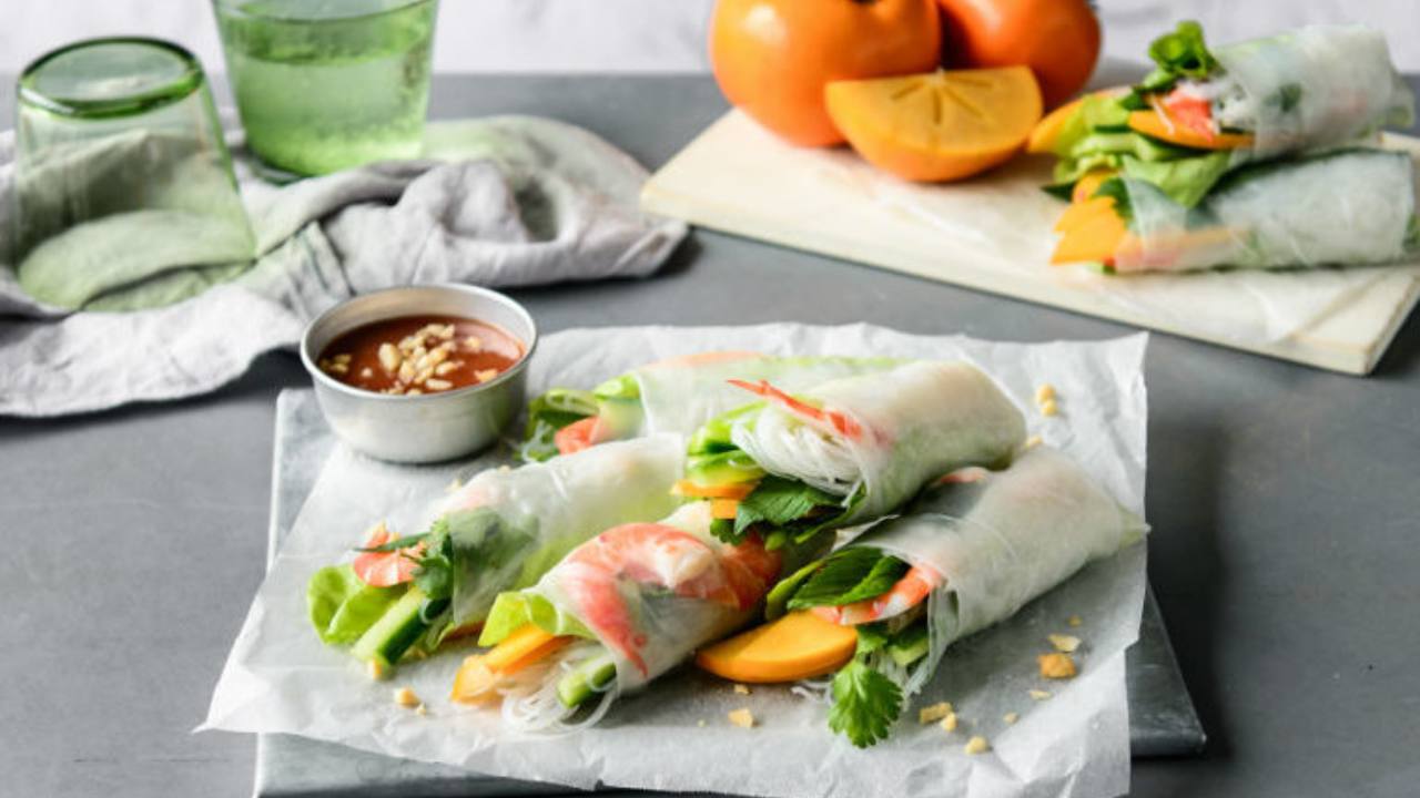 Tasty rice paper rolls with persimmon 