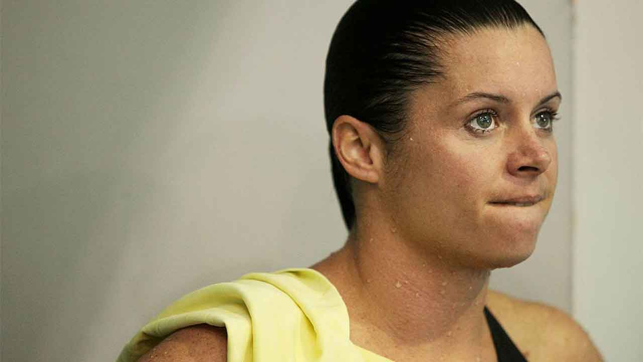 Olympic champ back in court on stealing and unlicensed driving charges